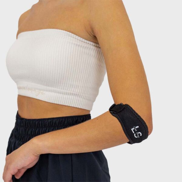 Opaska na łokieć tenisisty Line Sport - na łokciu